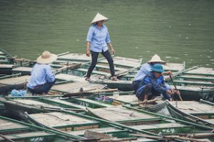 Workers who have tanned skin due to labour work outdoors