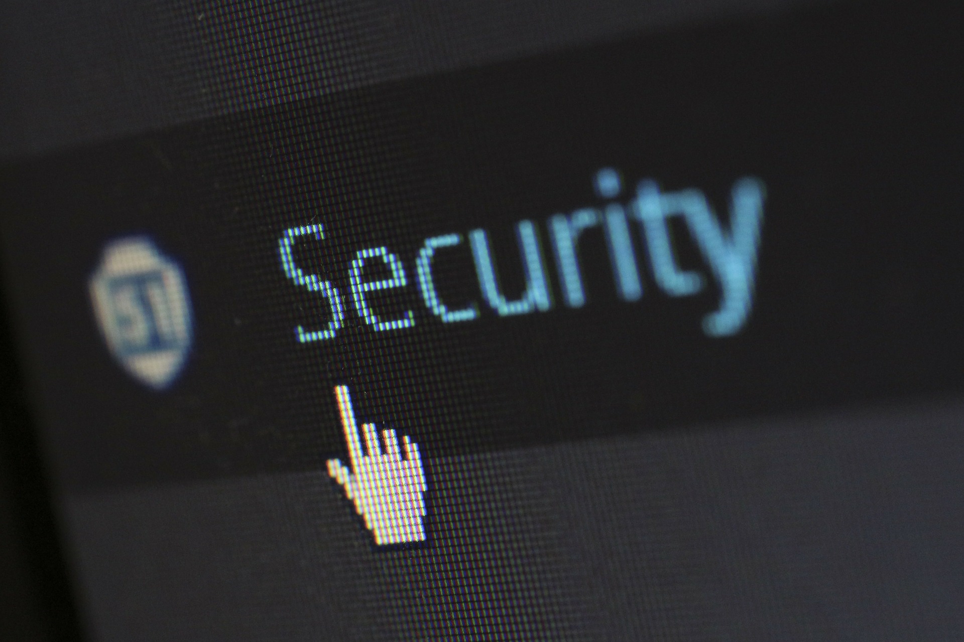 Mouse hand over a security link on a computer