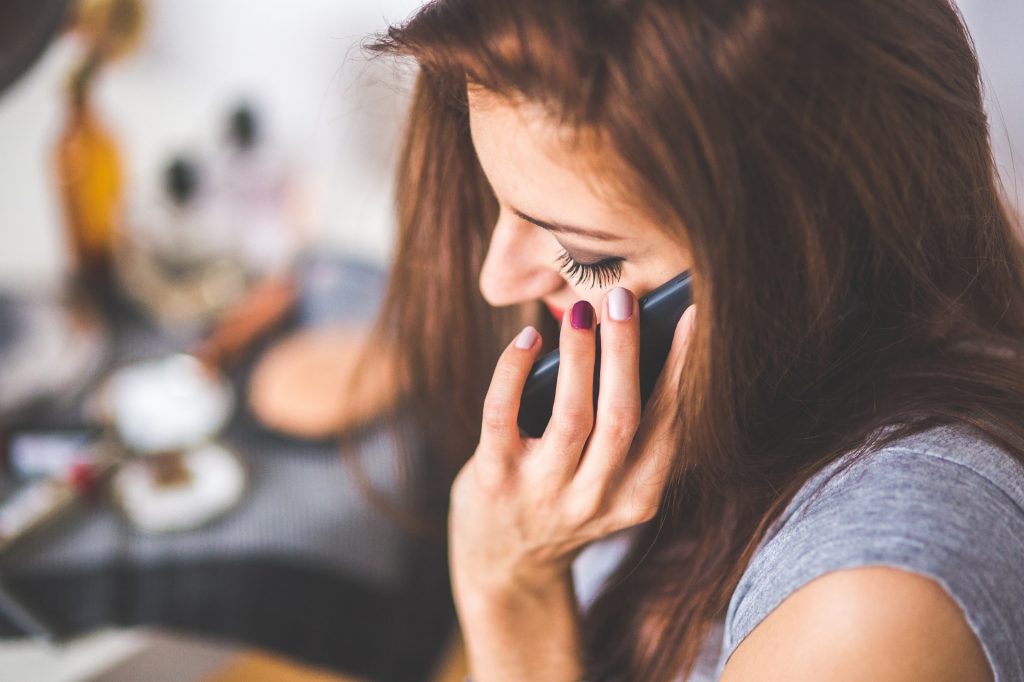 Photo of woman talking on the phone