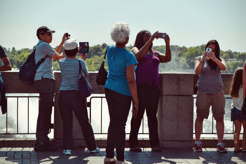 Photo of group of people taking photos